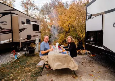 couple eating at rv campsite