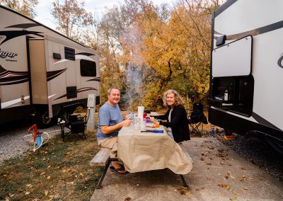 couple eating at rv campsite